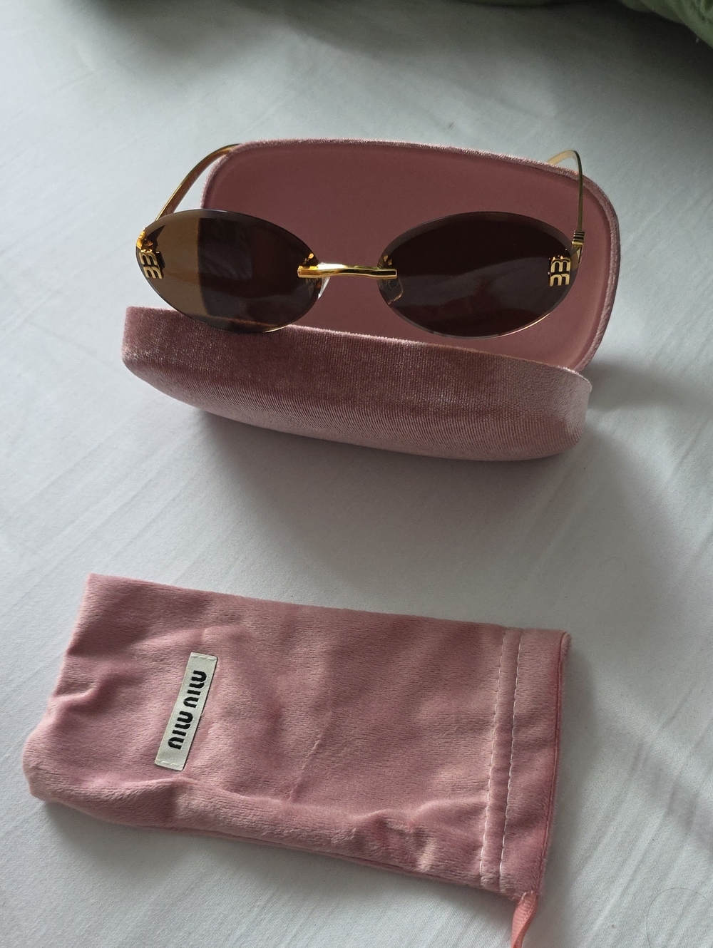 Miu Miu Gold-Frame Sunglasses with Pink Case and Brown Lenses